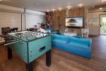 Show your housemates what you`re made of at the foosball table.